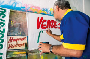 The painter Sebastião in his workshop near CECORA, Arcoverde-PE [2013].